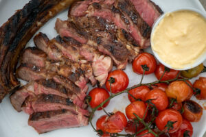 6082 Tomahawk steak, vine baby tomato, brown butter hollandaise 5 - HEADER